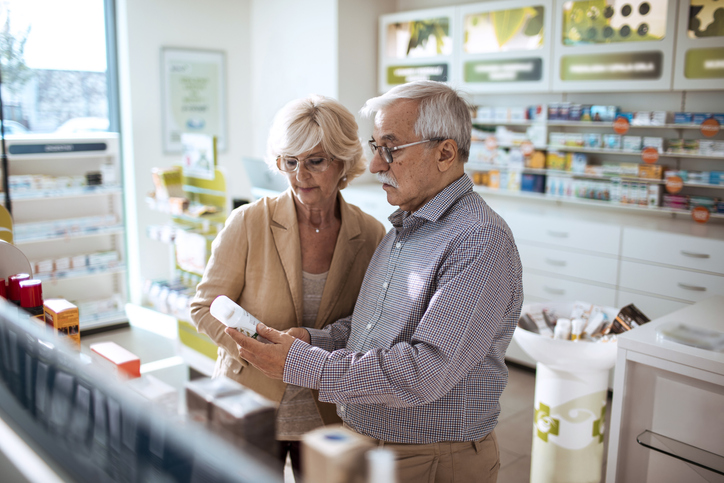 Close up of a senior couple browsing in a pharmacy